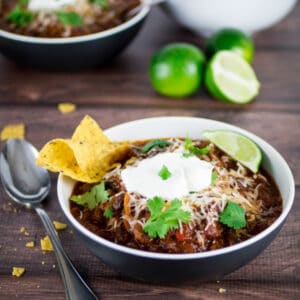 This is seriously the easiest, most delicious slow cooker turkey chili you will ever need. Spices combine with peppers and onions for big flavor in this meaty dish. You won't believe how simple it is the make! All you need to do is set it, forget it, and come home to a hot meal.