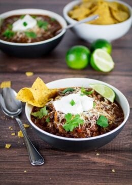 This is seriously the easiest, most delicious slow cooker turkey chili you will ever need. Spices combine with peppers and onions for big flavor in this meaty dish. You won't believe how simple it is the make! All you need to do is set it, forget it, and come home to a hot meal.