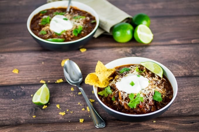 This is seriously the easiest, most delicious slow cooker turkey chili you will ever need. Spices combine with peppers and onions for big flavor in this meaty dish. You won't believe how simple it is the make! All you need to do is set it, forget it, and come home to a hot meal.
