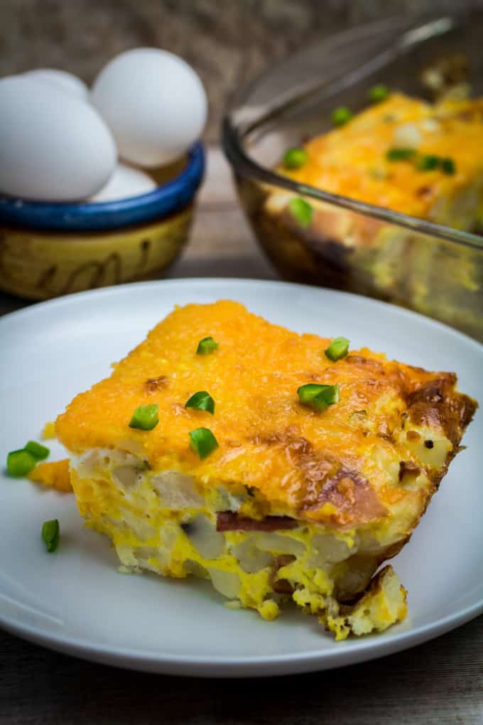 Savory hash browns, crispy bacon, cheese, and protein-rich eggs come together perfectly in this Easy Breakfast Casserole. Add green bell pepper and a dash of cayenne to take this breakfast (or brunch!) to the next level.