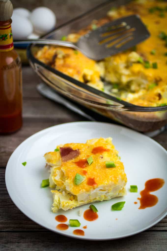 Savory hash browns, crispy bacon, cheese, and protein-rich eggs come together perfectly in this Easy Breakfast Casserole. Add green bell pepper and a dash of cayenne to take this breakfast (or brunch!) to the next level.