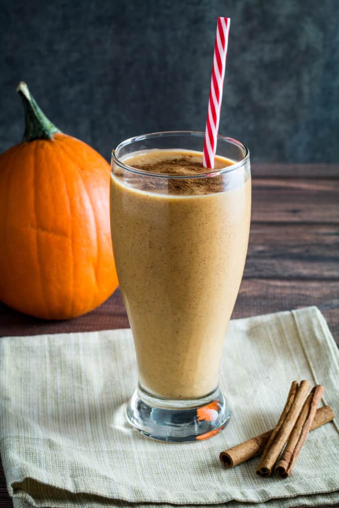 Creamy, smooth, and sinfully sweet, you won't believe how easy this Breakfast Pumpkin Pie Smoothie is to make! With nutritious oatmeal and yogurt, this smoothie tastes exactly like pumpkin pie in a glass, bringing the flavors of autumn to your breakfast table. Best of all, it's like having dessert for breakfast! 