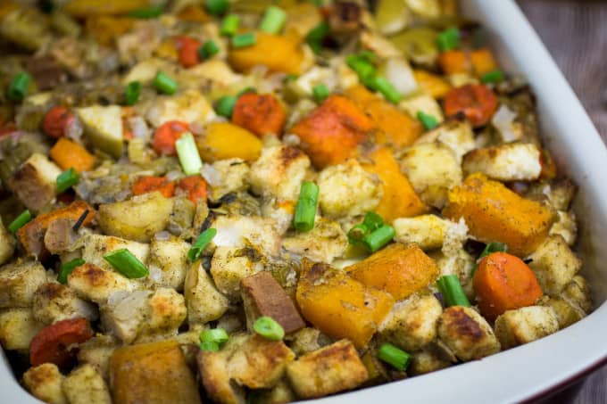 Savory, sweet, and packed with the flavors of herbs and autumn vegetables, this Root Vegetable Gluten Free Stuffing is the perfect addition to your Thanksgiving table. Apples, raisins, and apple cider come together with a mix of root vegetables, gluten free bread, herbs, and a buttery vegetable broth to bring your holiday stuffing to the next level.