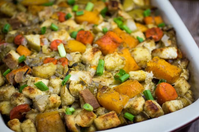 Savory, sweet, and packed with the flavors of herbs and autumn vegetables, this Root Vegetable Gluten Free Stuffing is the perfect addition to your Thanksgiving table. Apples, raisins, and apple cider come together with a mix of root vegetables, gluten free bread, herbs, and a buttery vegetable broth to bring your holiday stuffing to the next level.