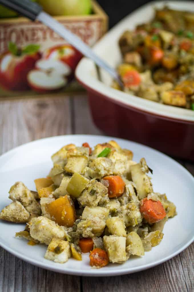 Savory, sweet, and packed with the flavors of herbs and autumn vegetables, this Root Vegetable Gluten Free Stuffing is the perfect addition to your Thanksgiving table. Apples, raisins, and apple cider come together with a mix of root vegetables, gluten free bread, herbs, and a buttery vegetable broth to bring your holiday stuffing to the next level.