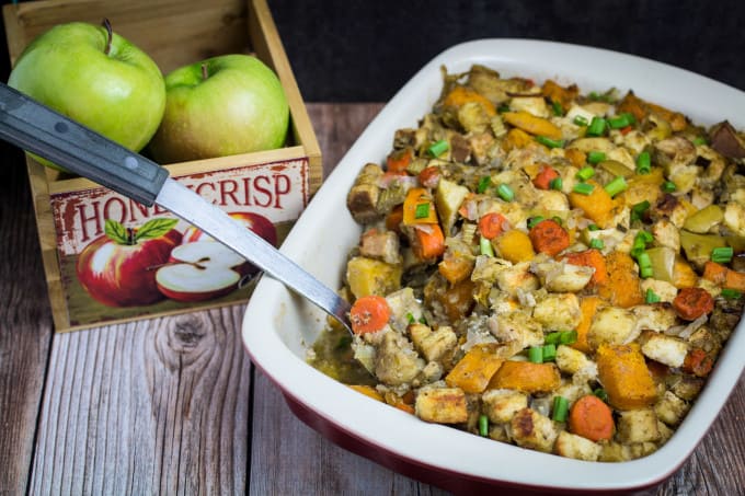 Savory, sweet, and packed with the flavors of herbs and autumn vegetables, this Root Vegetable Gluten Free Stuffing is the perfect addition to your Thanksgiving table. Apples, raisins, and apple cider come together with a mix of root vegetables, gluten free bread, herbs, and a buttery vegetable broth to bring your holiday stuffing to the next level.