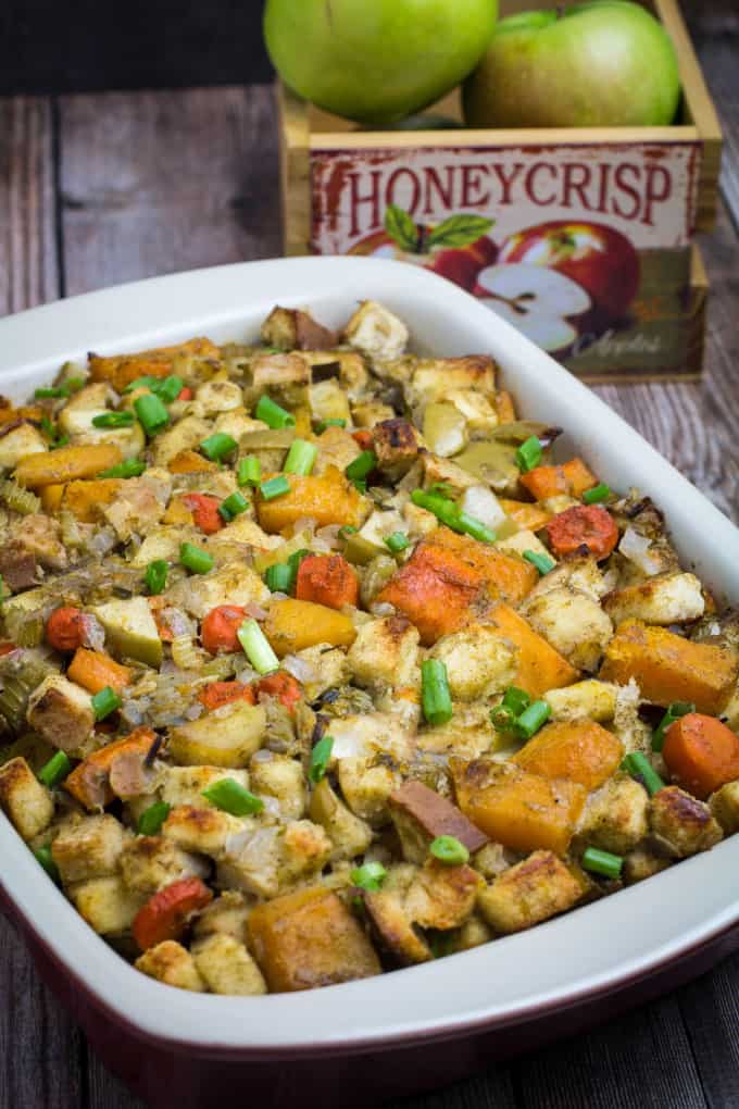 Savory, sweet, and packed with the flavors of herbs and autumn vegetables, this Root Vegetable Gluten Free Stuffing is the perfect addition to your Thanksgiving table. Apples, raisins, and apple cider come together with a mix of root vegetables, gluten free bread, herbs, and a buttery vegetable broth to bring your holiday stuffing to the next level.