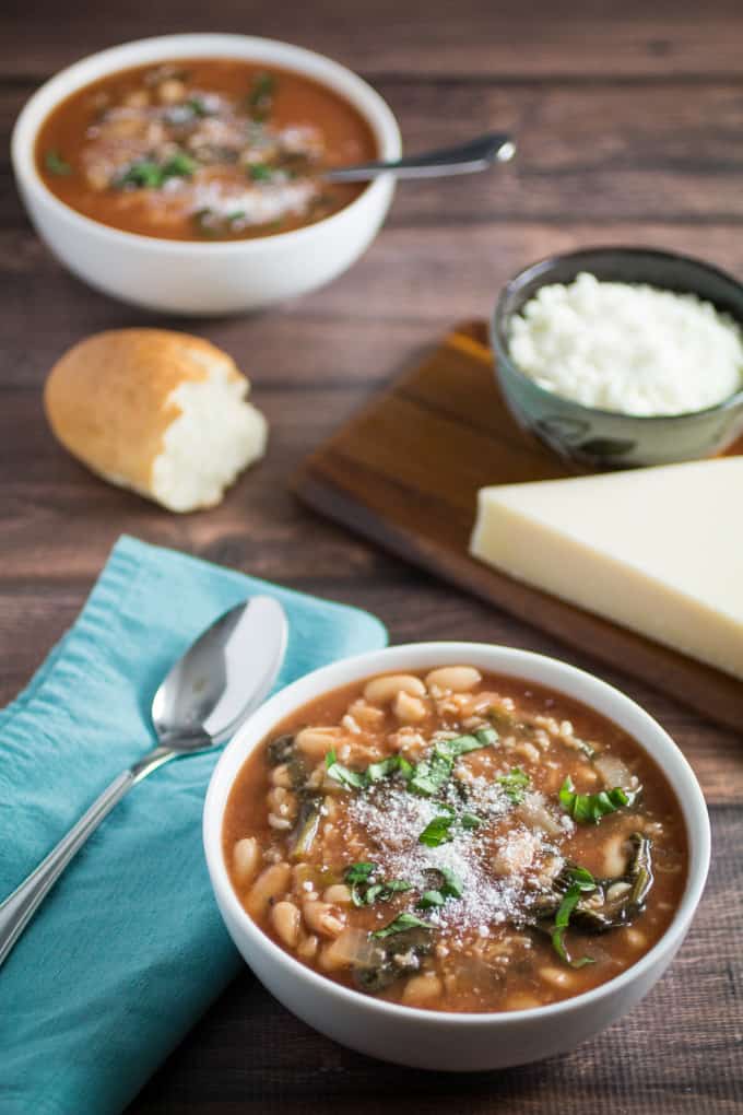 Hearty, savory, and satisfying, this easy Slow Cooker Kale and White Bean Soup is the perfect no-fuss meal on a chilly autumn night. Italian flavors of garlic, basil, and thyme come together in slow cooker perfection, leaving you with a nutritious meal that feeds both your body and your soul. Top with parmesan and enjoy a meal that's so easy to make and ready when you are!