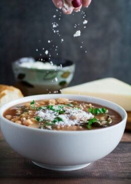 Hearty, savory, and satisfying, this easy Slow Cooker Kale and White Bean Soup is the perfect no-fuss meal on a chilly autumn night. Italian flavors of garlic, basil, and thyme come together in slow cooker perfection, leaving you with a nutritious meal that feeds both your body and your soul. Top with parmesan and enjoy a meal that's so easy to make and ready when you are!