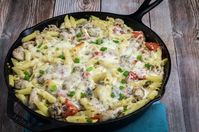 Herb-y chicken and penne pasta sauteed in a white wine tomato and basil sauce, then smothered in mozzarella cheese and baked to perfection. One Pot Chicken Penne with Tomato and Basil is the perfect quick and easy meal to add to your weeknight dinner schedule. Best of all, this one pot recipe is done in only 30 minutes! 