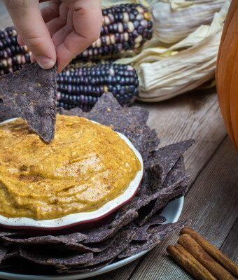 Creamy and sweet, this is one fast way to bring the holiday flavors of pumpkin pie to your table. Easy Pumpkin Pie Dip is made with real pumpkin, sweet maple syrup, and autumn spices. Serve with corn chips or vanilla cookies for a quick snack or dessert your guests will love!