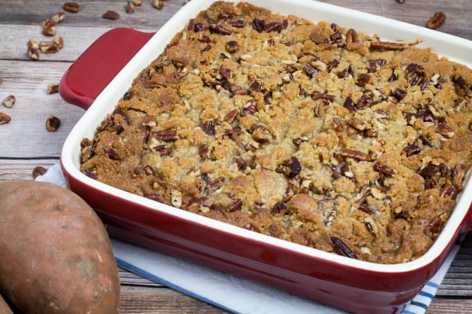 This traditional Thanksgiving casserole recipe uses baked sweet potatoes mashed together with brown sugar and autumn spices, then topped with a sweet and crunchy layer of crumble and pecans. A touch of maple syrup brings the rich, buttery taste of this Easy Sweet Potato Casserole with Pecan Crumble Topping to the next level! This really is the perfect side dish for your holiday table.