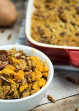 This traditional Thanksgiving casserole recipe uses baked sweet potatoes mashed together with brown sugar and autumn spices, then topped with a sweet and crunchy layer of crumble and pecans. A touch of maple syrup brings the rich, buttery taste of this Easy Sweet Potato Casserole with Pecan Crumble Topping to the next level! This really is the perfect side dish for your holiday table.