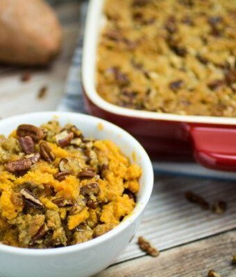 This traditional Thanksgiving casserole recipe uses baked sweet potatoes mashed together with brown sugar and autumn spices, then topped with a sweet and crunchy layer of crumble and pecans. A touch of maple syrup brings the rich, buttery taste of this Easy Sweet Potato Casserole with Pecan Crumble Topping to the next level! This really is the perfect side dish for your holiday table.