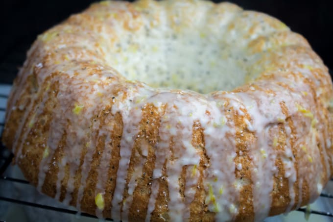 Sweet and sour come together in a perfect pairing with this Gluten Free Lemon Poppy Seed Angel Food Cake. Light and fluffy angel food cake is mixed with the tart flavor of lemon, nutty poppy seeds, and drizzled with a sweet lemon-sugar icing that takes this twist on the classic angel food cake over the top. You'll never even know it's gluten free!