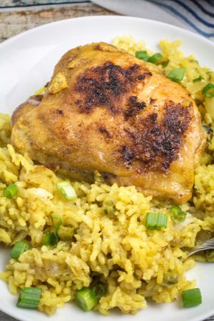 One Pot Lemon-Garlic Chicken with Yellow Rice • Dishing Delish