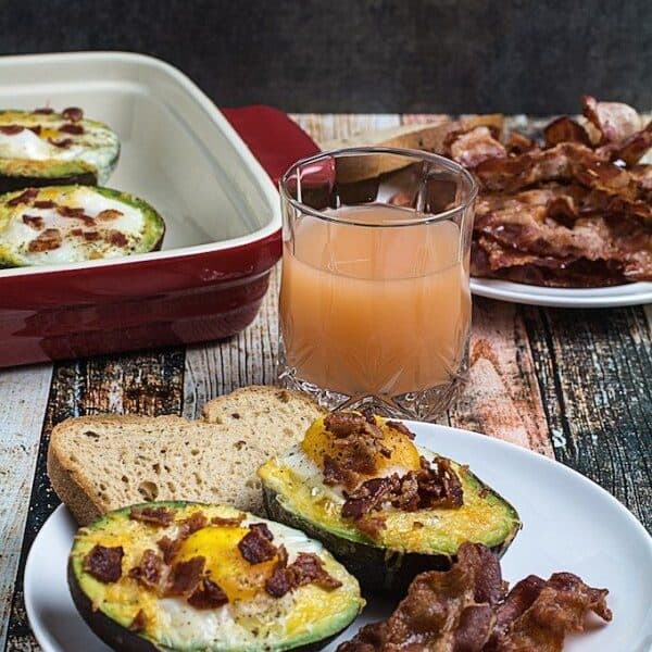 Bacon Egg & Cheese Baked Avocados • Dishing Delish