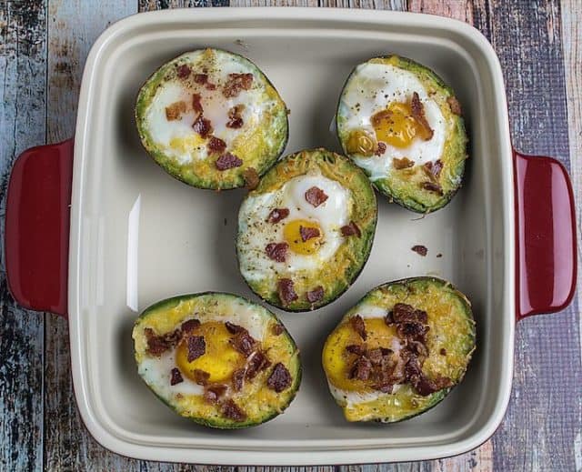 Bacon Egg & Cheese Baked Avocados • Dishing Delish