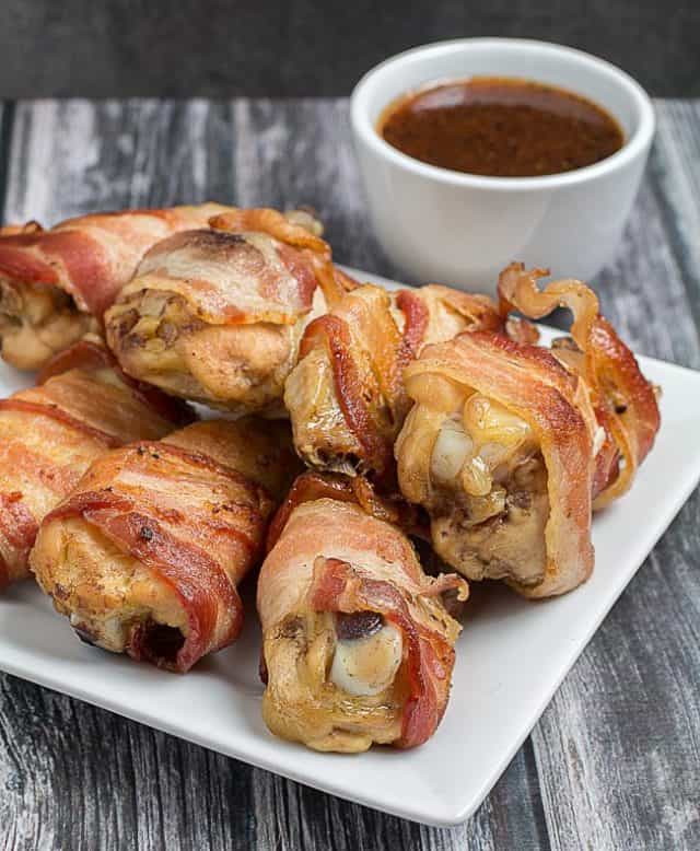 Bacon Wrapped Chicken Wings With Tequila Chipotle Sauce • Dishing Delish