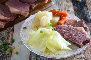 Slow Cooker Corned Beef And Cabbage • Dishing Delish