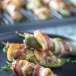 bacon wrapped sausage stuffed jalapenos