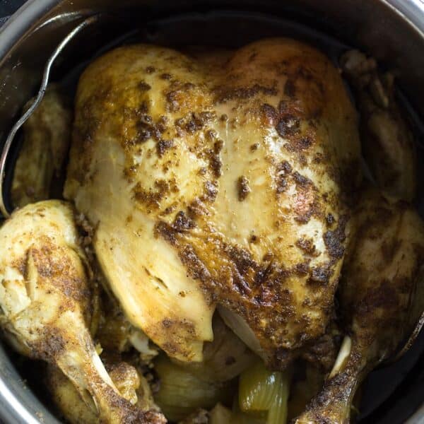 Instant Pot Whole Chicken With Garlic & Herbs • Dishing Delish