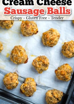Pinterest pin for cream cheese sausage balls on a sheet pan with parchment paper