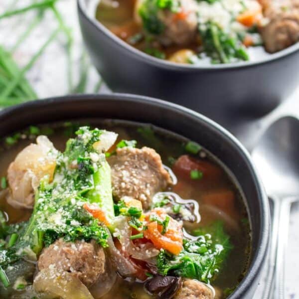 Slow Cooker Kale Bean & Sausage Soup • Dishing Delish