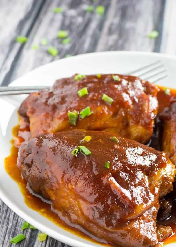 BEST Crockpot BBQ Chicken Thighs Ever • Dishing Delish