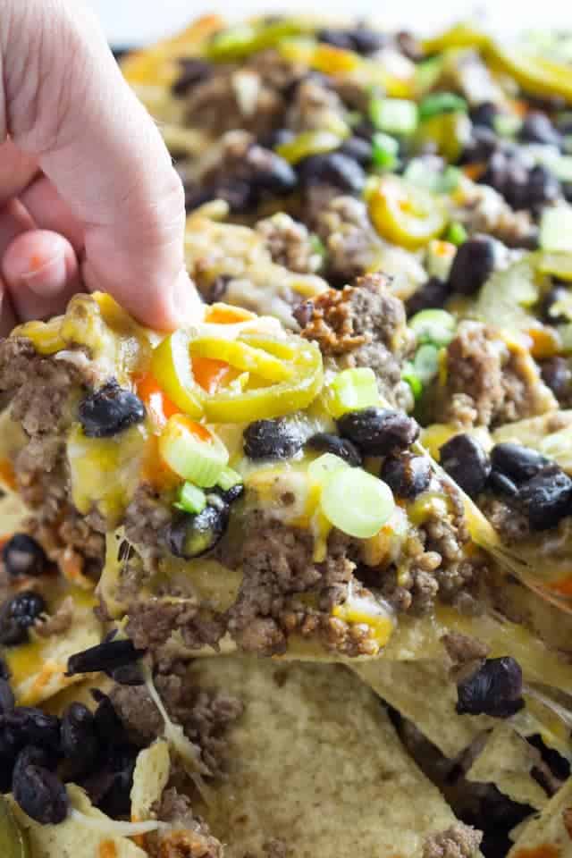 Ground Beef Nachos Cheesy, Meaty, Spicy! • Dishing Delish