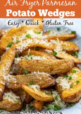 Pinterest pin of side view of air fryer potato wedges topped with parmesan and chopped chives. Graphic says Quick, Easy, and Gluten Free