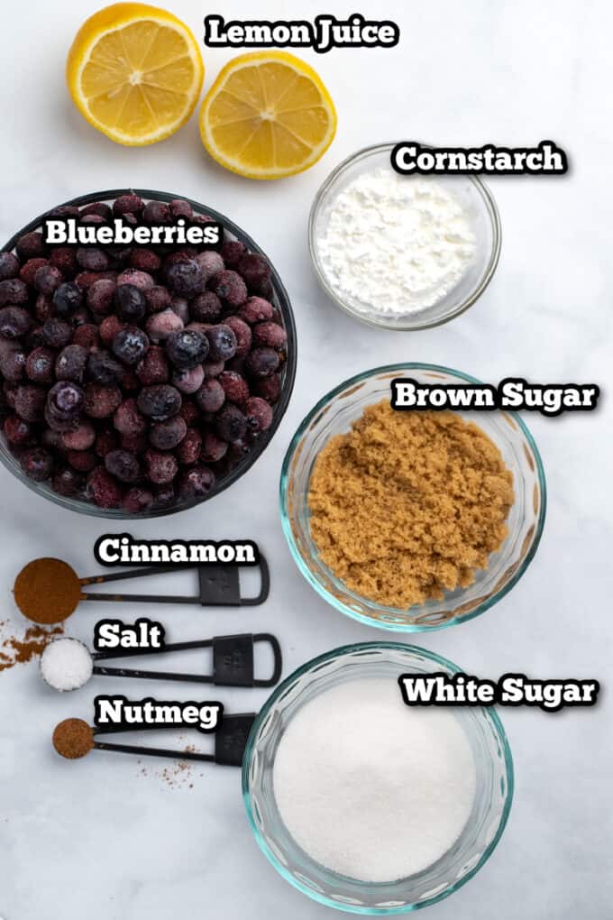 All of the ingredients for making blueberry pie filling.