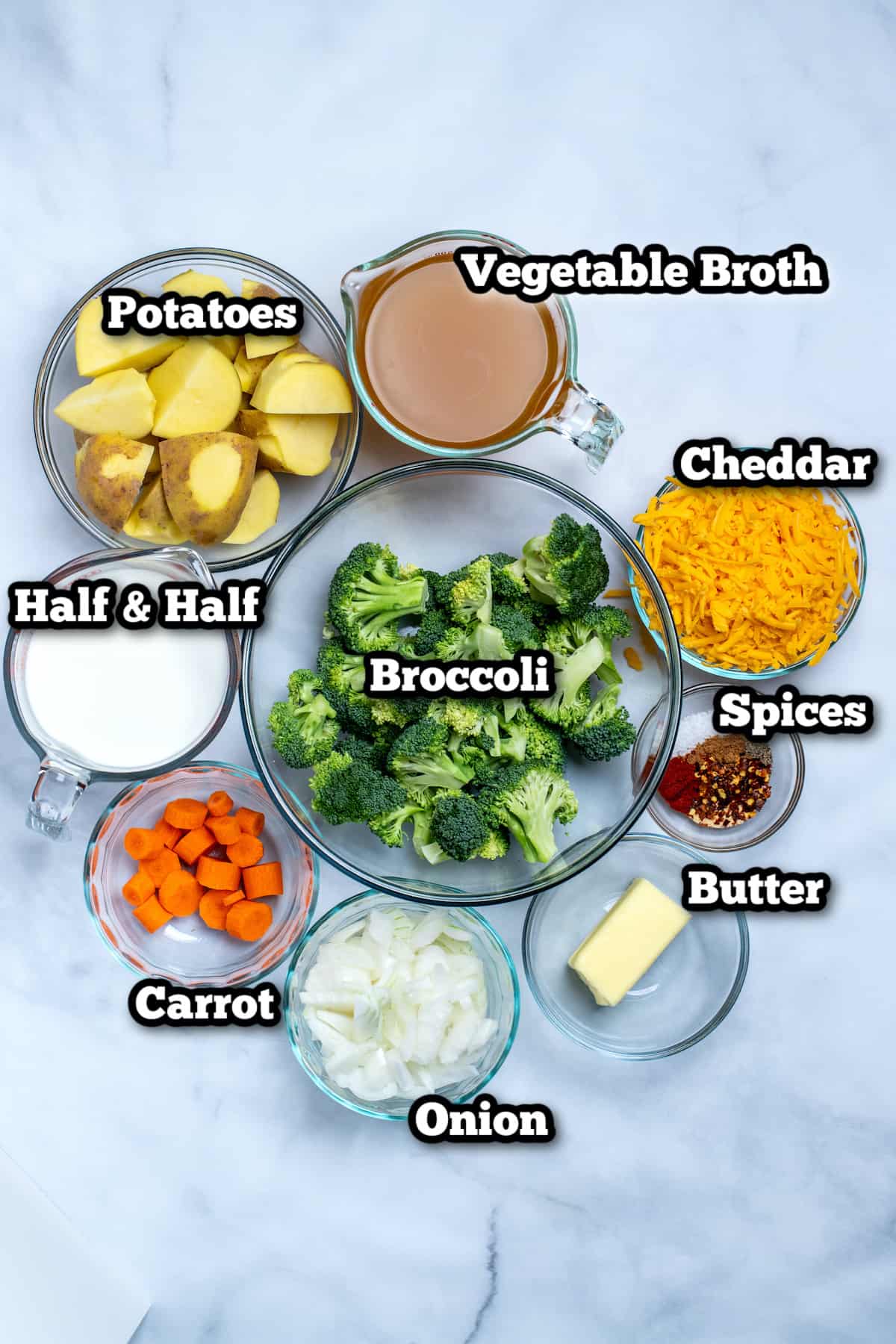 Ingredients for broccoli cheddar soup on a table