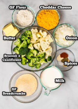 ingredients on a table for broccoli cauliflower casserole