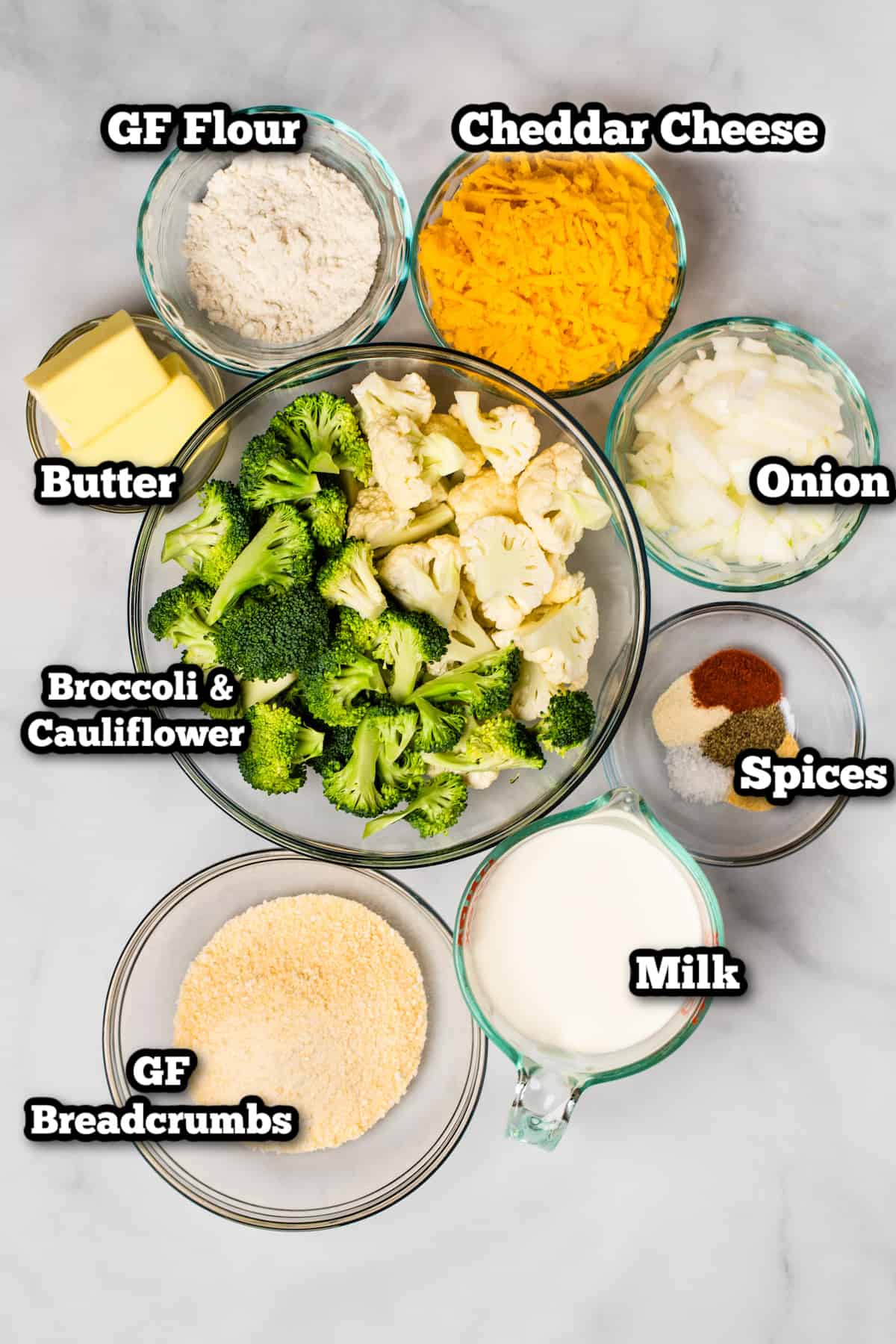 ingredients on a table for broccoli cauliflower casserole
