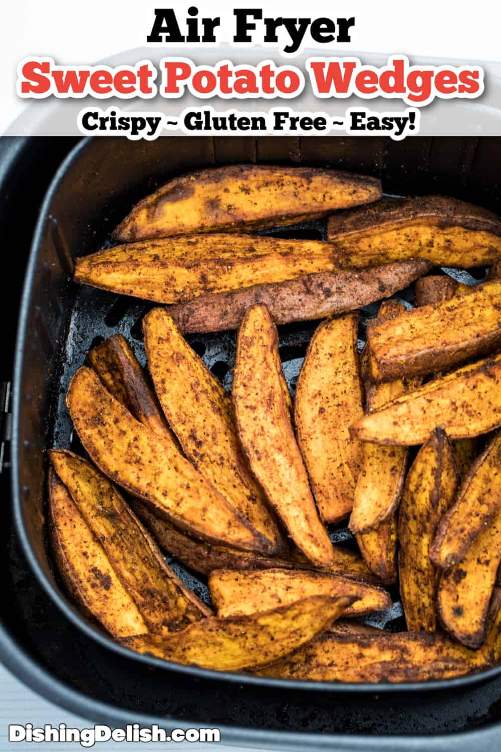 Air Fryer Sweet Potato Wedges in the basket of an air fryer.