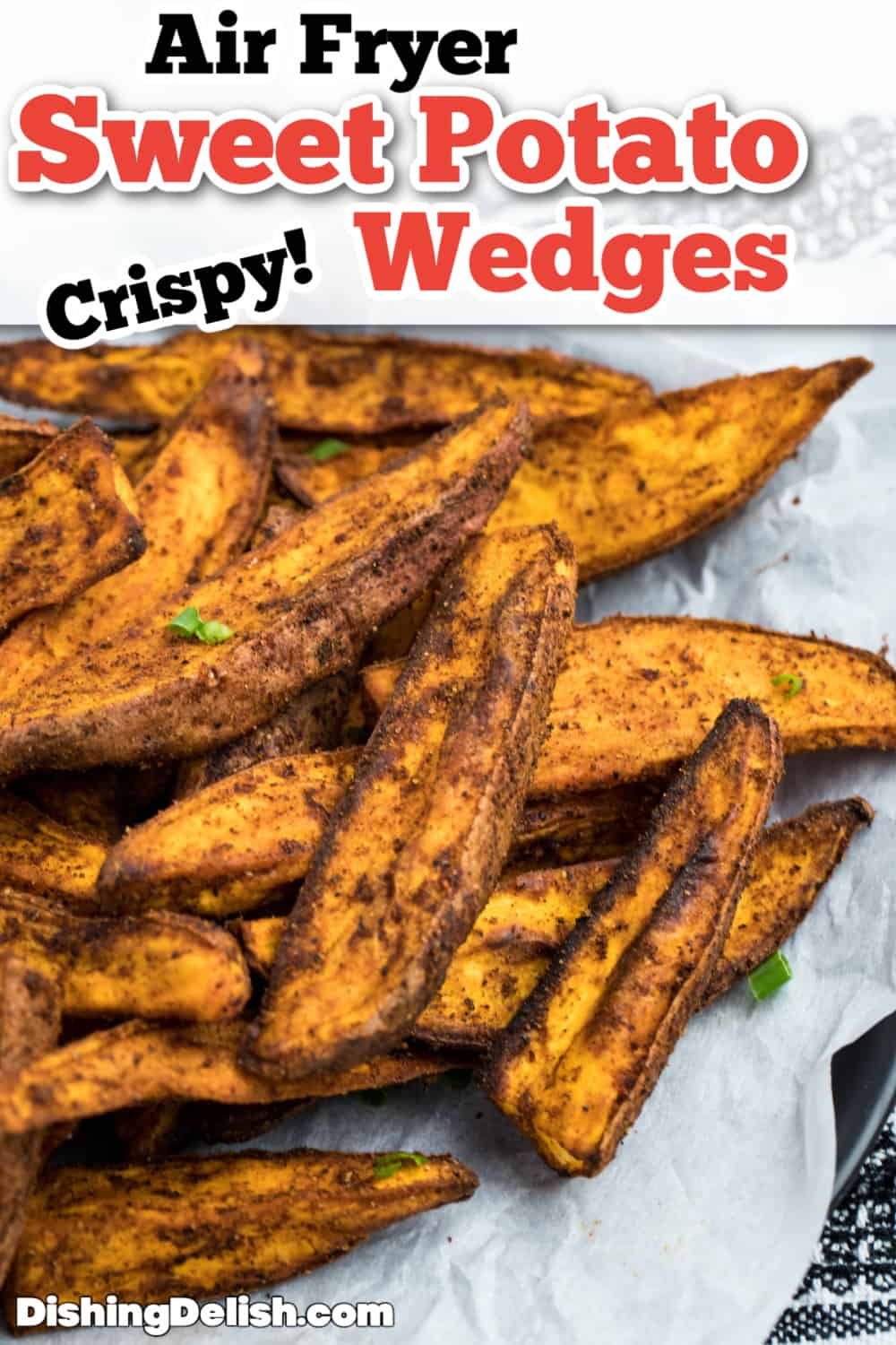 Air Fryer Sweet Potato Wedges on top of parchment paper.