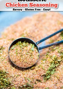 Pinterest pin for Rotisserie Chicken Seasoning with a tablespoon scooping up the spices.