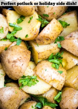 Pinterest pin with a photo of quartered potatoes in a slow cooker with fresh parsley on top.