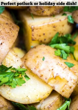 Pinterest pin with a photo of quartered potatoes in a slow cooker with fresh parsley on top.
