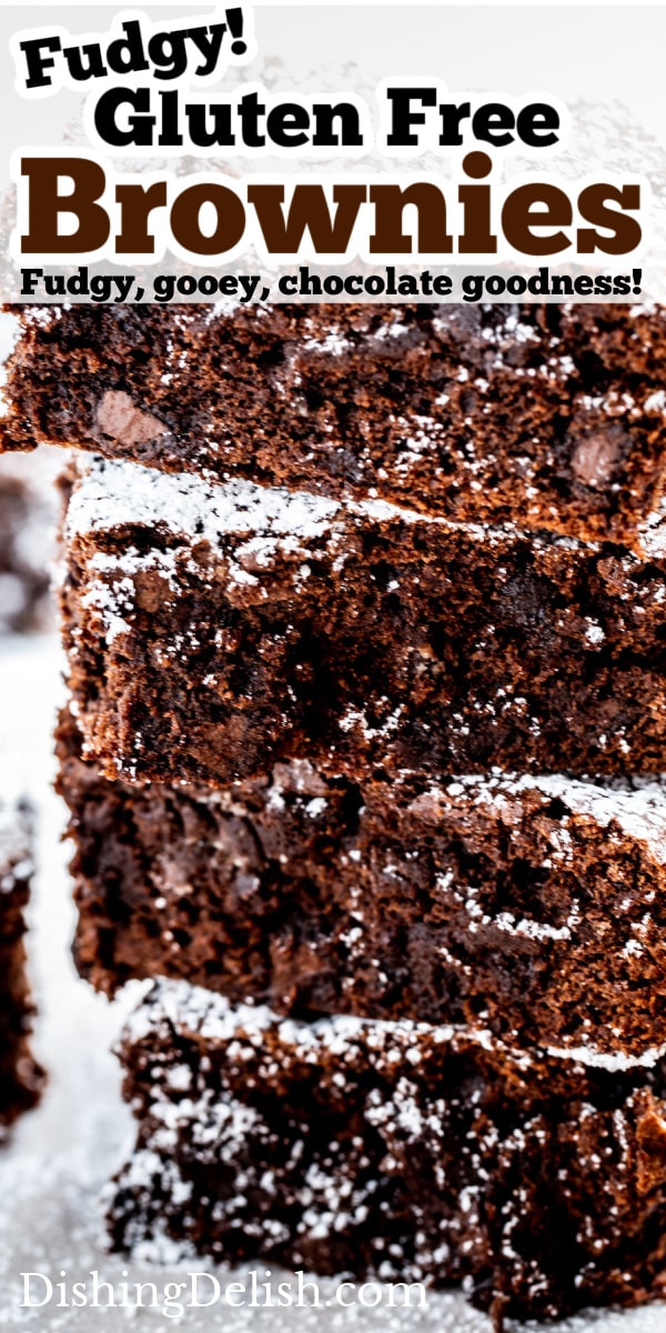 Pinterest pin with a photo of four brownies stacked on top of each other dusted in powdered sugar.