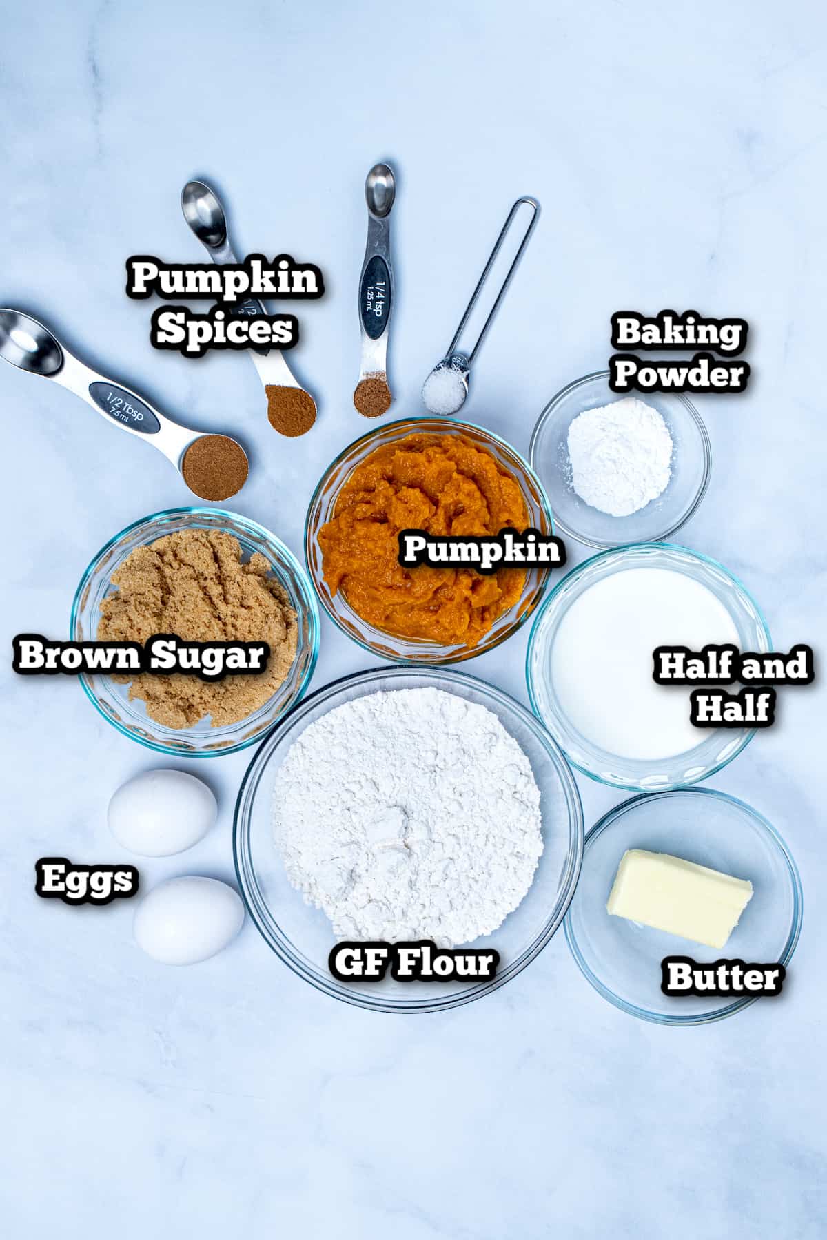 Ingredients for gluten free pumpkin muffins on a table.