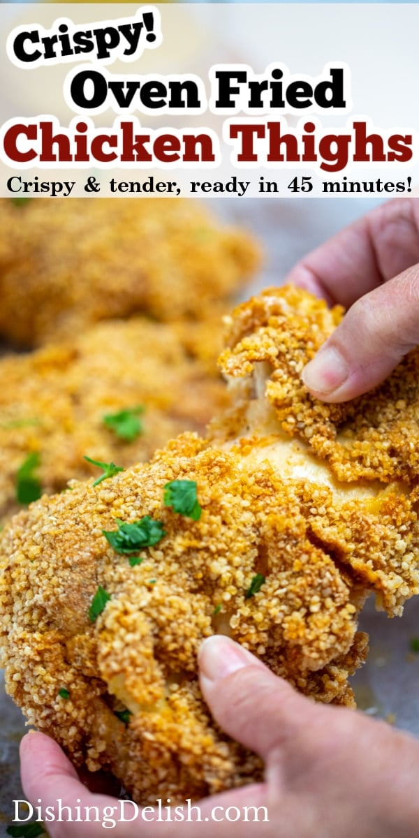 Pinterest pin of oven friend chicken thighs with a hand holding a crispy piece of chicken on top of parchment paper.