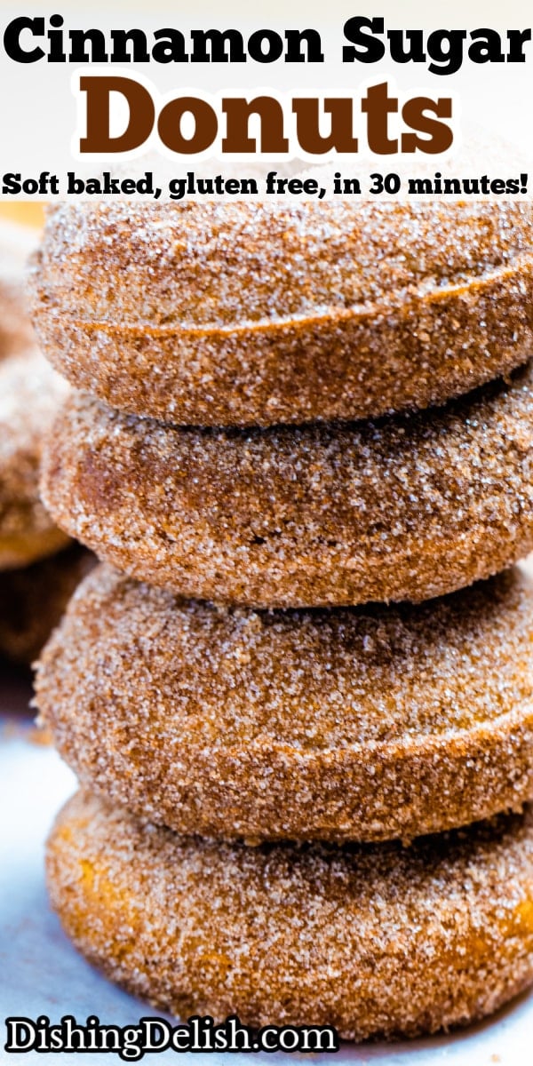 Pinterest pin with four doughnuts coated in cinnamon sugar stacked on top of each other.