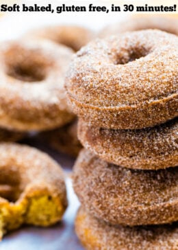 Pinterest pin with four doughnuts coated in cinnamon sugar stacked on top of each other.