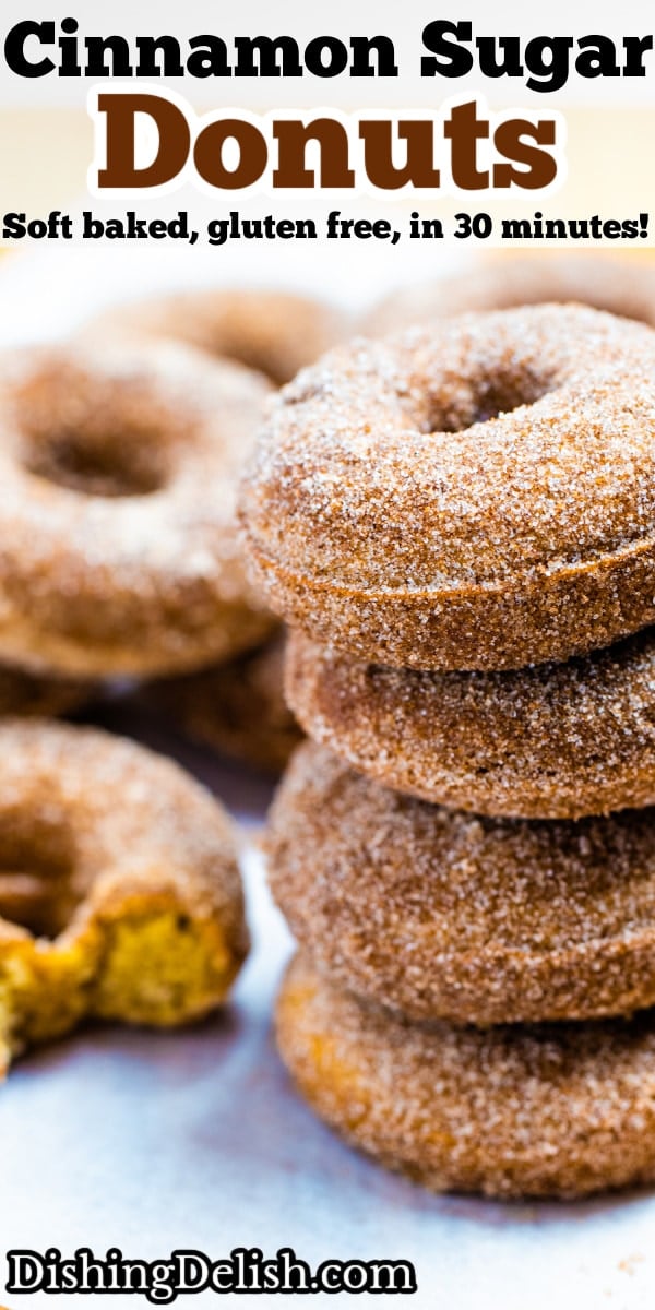 Pinterest pin with four doughnuts coated in cinnamon sugar stacked on top of each other.