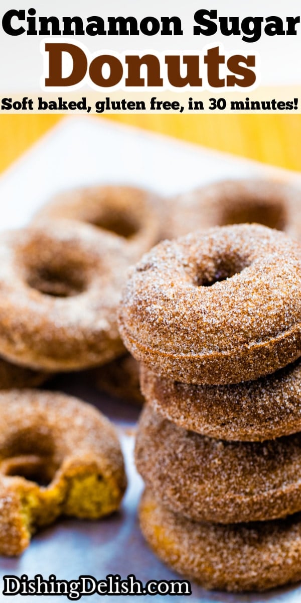 Pinterest pin with four doughnuts coated in cinnamon sugar stacked on top of each other.
