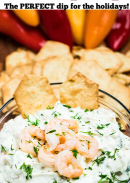 Pinterest pin of a bowl of shrimp dip with mini shrimp on top next to gluten free crackers.