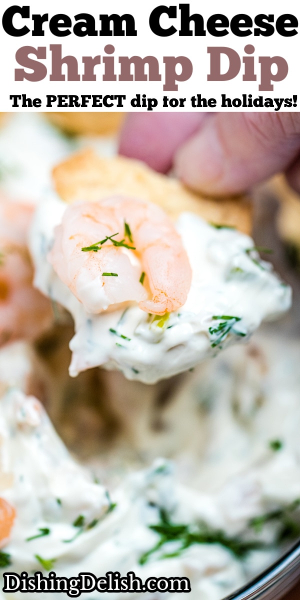 Pinterest pin of a bowl of shrimp dip with a hand scooping dip onto a cracker.