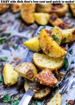 Pinterest pin with a spatula on a sheet pan of garlic parmesan roasted potatoes.